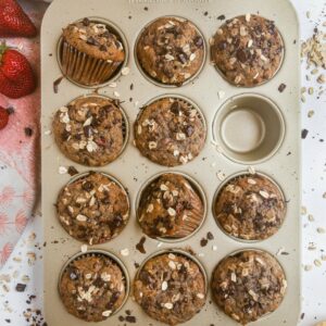 A tray of oatmeal strawberry banana chocolate muffins