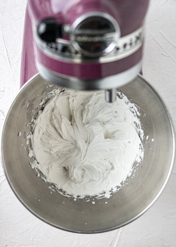 a mixing bowl with dairy free whipping cream in it