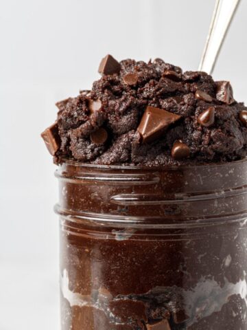 edible brownie batter in a jar with chocolate chips