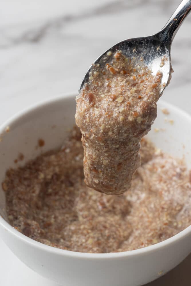 a spoon scooping out a flax egg