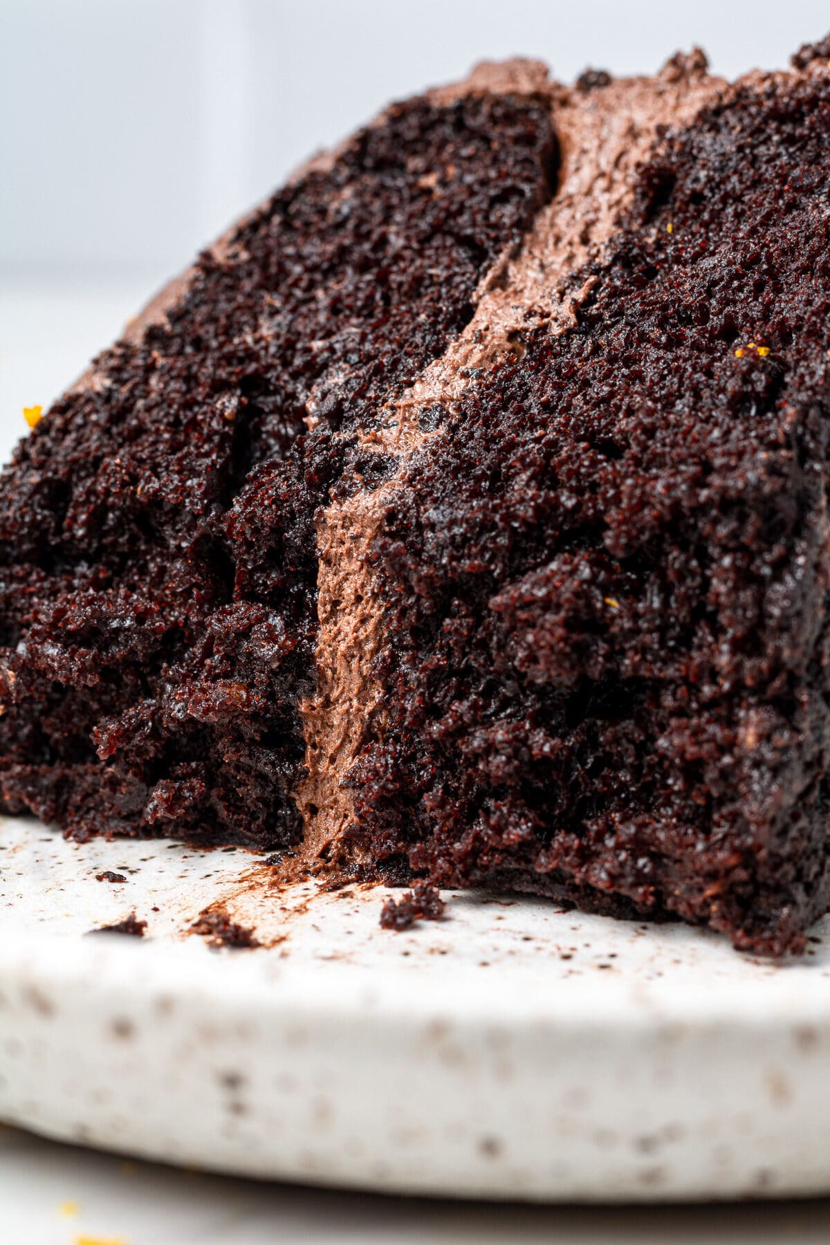 close up of a slice of chocolate orange cake