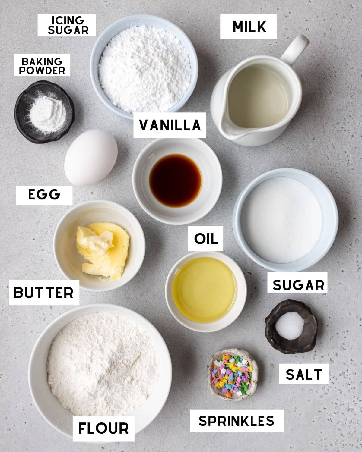 4 inch cake recipe ingredients in bowls with labels