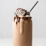Nutella Milkshake topped with whip cream and a straw