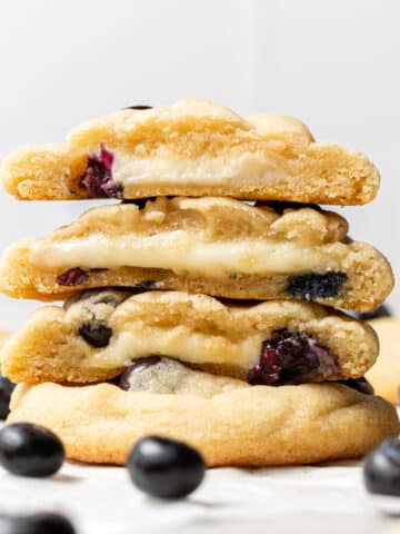 blueberry cheesecake cookies stacked on top of each other
