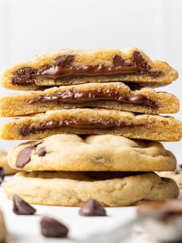 chocolate filled cookies stacked on top of each other and split in half