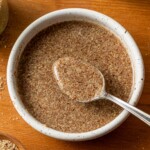 spoon full of flax egg over a bowl
