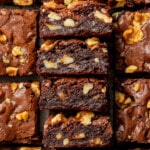 Close-up of sliced chocolate brownies topped with walnuts. The brownies have a rich, moist texture, and the walnuts add a crunchy contrast.